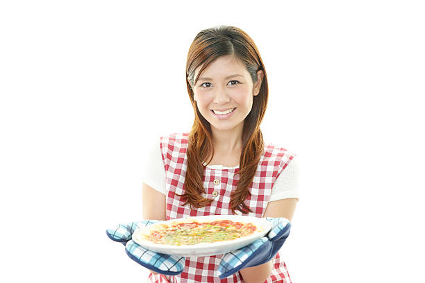 istock Beautiful cooking woman in apron 478646225