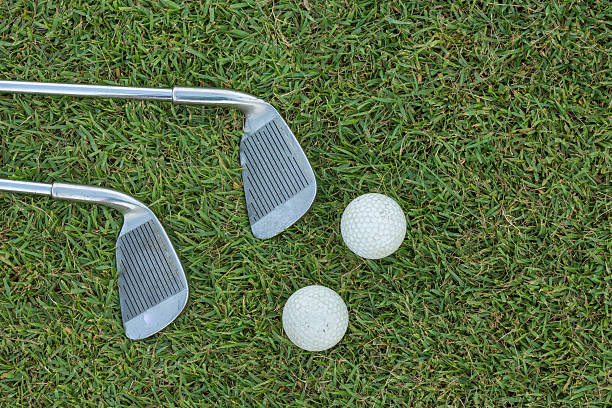 istock Golf club and ball in grass 478649278