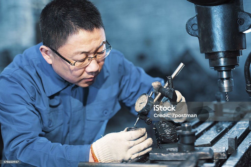 engineer on routine maintenance Accuracy Stock Photo