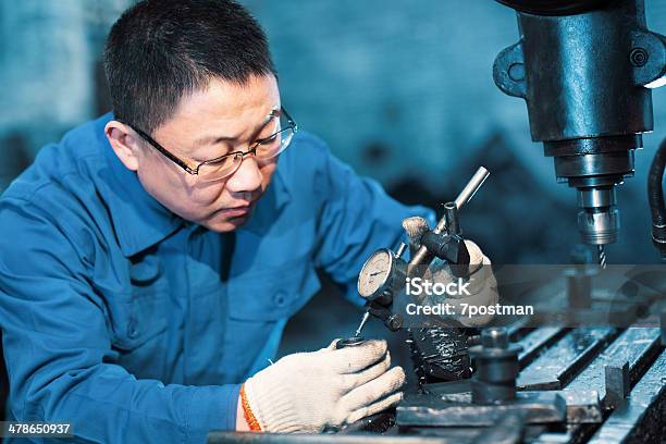 Engineer On Routine Maintenance Stock Photo - Download Image Now - Accuracy, Adult, Asian and Indian Ethnicities