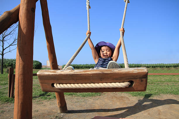 Japanese boy on the swing (3 years old)
