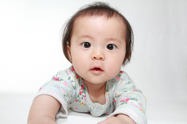 istock Crawling Japanese baby girl (0 year old) 478659002