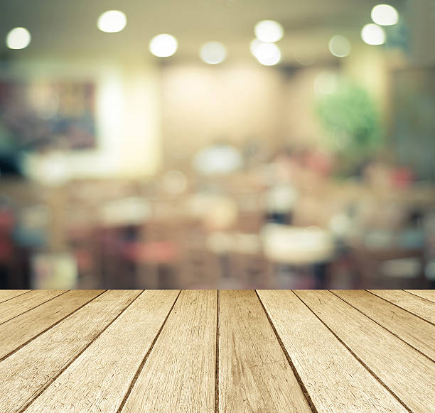 istock Perspective wood over blurred restaurant with bokeh background 478660070