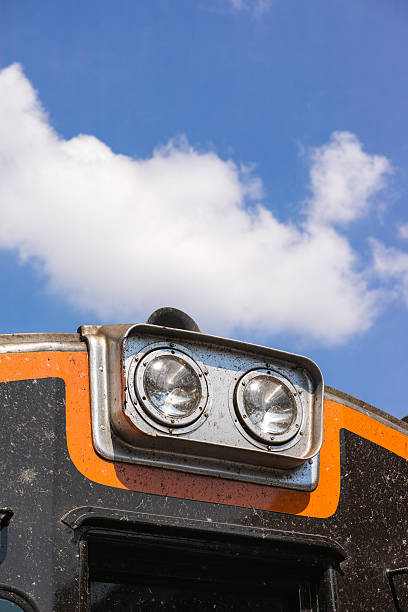 istock Headlamp of railway on sky background 478667176