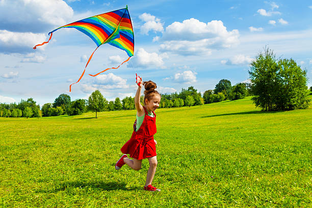 6 years old girl with kite