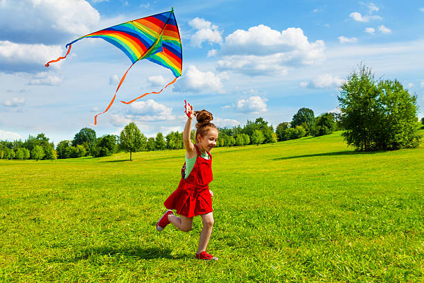 6 years old girl with kite - flying kite bildbanksfoton och bilder