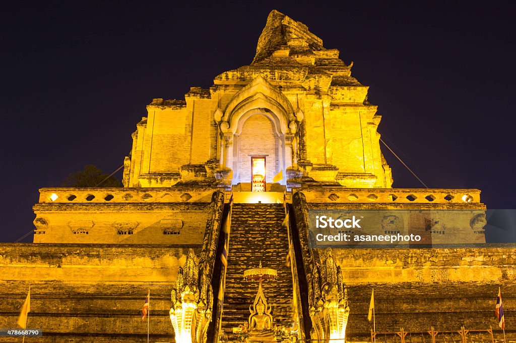 Ancient Buddhist pagoda in public not to copy or use. Ancient pagoda at Wat Chedi Luang temple 700 years in Chiang Mai, Asia Thailand, They are public domain or treasure of Buddhism, no restrict in copy or use 2015 Stock Photo