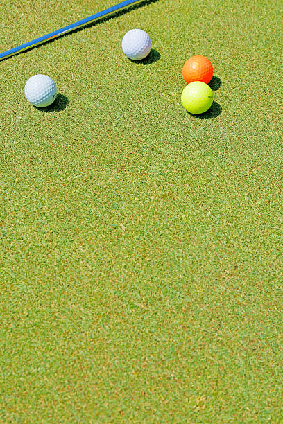 istock Golf ball and a fresh green lawn 478672856
