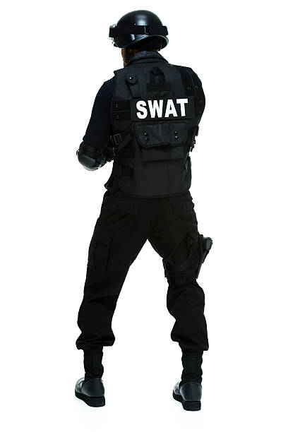 istock Rear view of swat standing 478672931