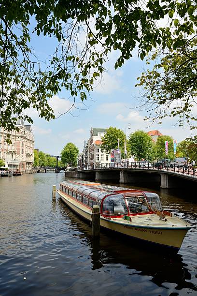 Canal tour Amsterdam stock photo