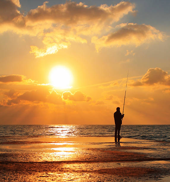istock Reflection of a fisherman at dawn 478676568