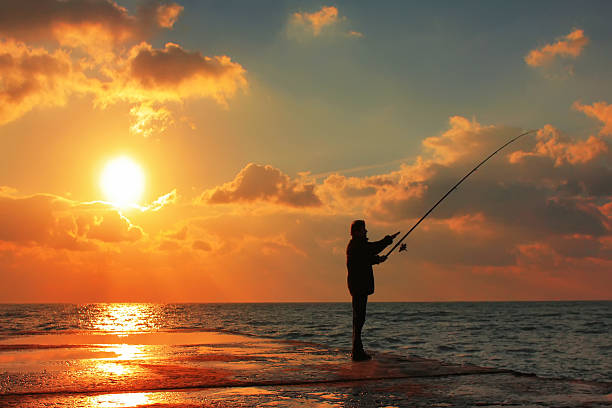 istock Fisherman on the sea pier 478676572