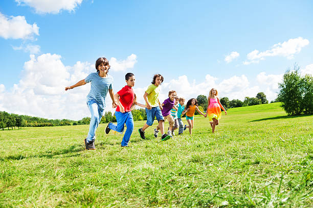 istock Many boys and girls running 478677077