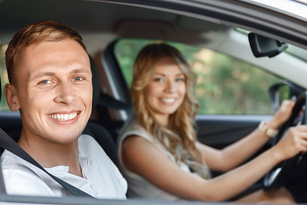 istock Young couple in the car 478677402