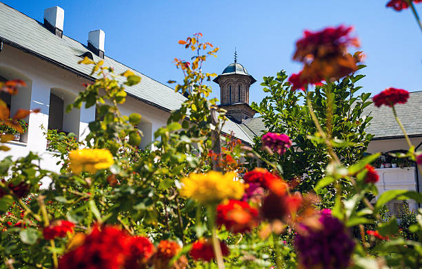 Cozia monastery church with visiting tourists stock photo