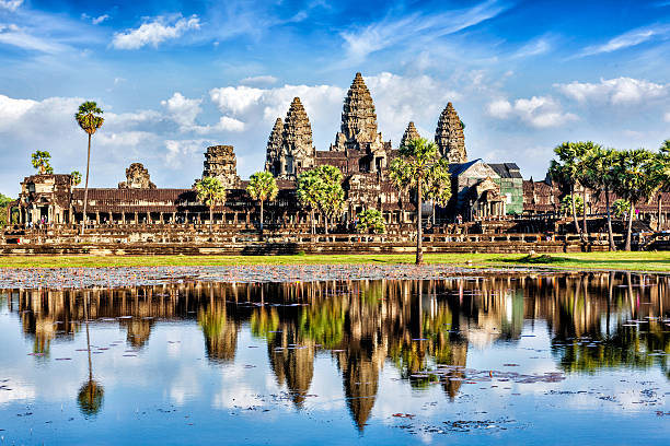 Angkor Wat Cambodia landmark wallpaper - Angkor Wat with reflection in water cambodian culture photos stock pictures, royalty-free photos & images