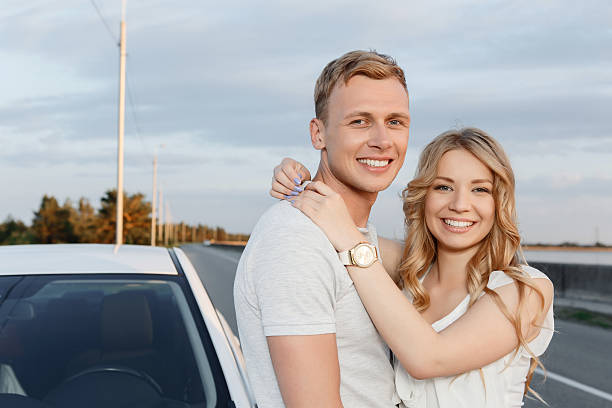 istock Lovely couple near the car 478678064