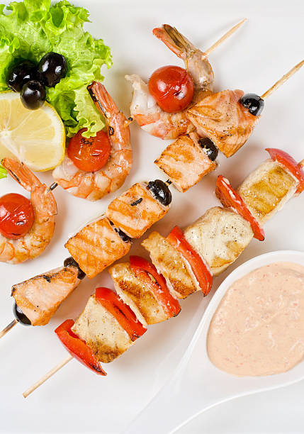 istock grilled salmon and shrimps 478689485