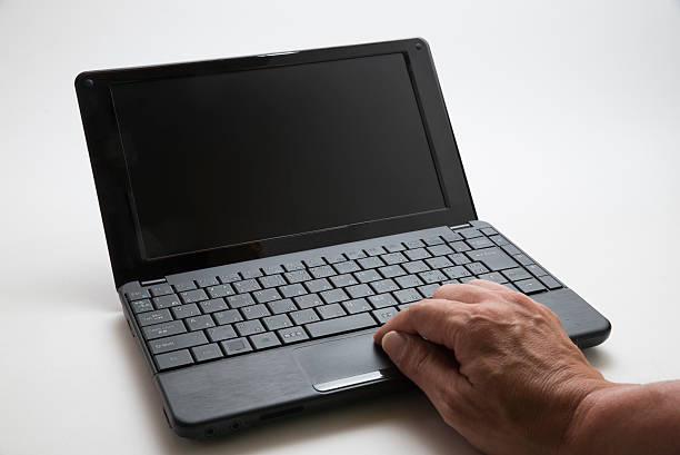 istock Note PC with Hands of Japanese People 478693322
