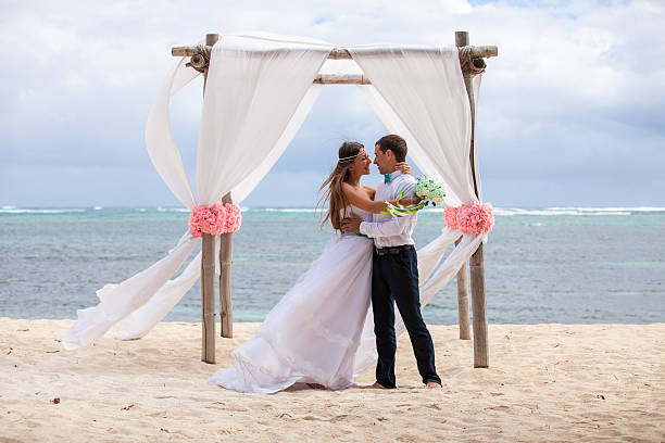 istock Young loving couple wedding in gazebo. 478694244
