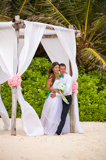 istock Young loving couple wedding in gazebo. 478694258