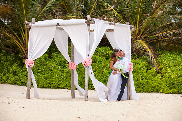 istock Young loving couple wedding in gazebo. 478694278