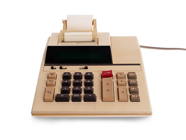 Old calculator for doing office related work stock photo
