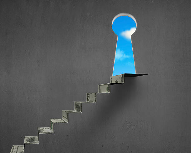 istock Money stairs with key hole and blue sky 478694681