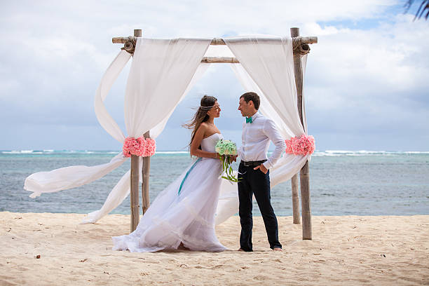 istock Young loving couple wedding in gazebo. 478695560