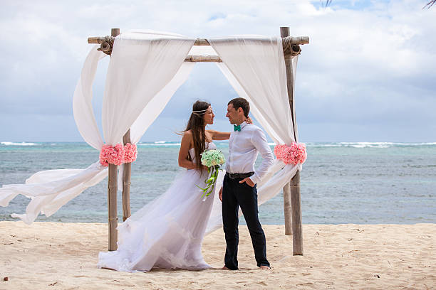 istock Young loving couple wedding in gazebo. 478695566