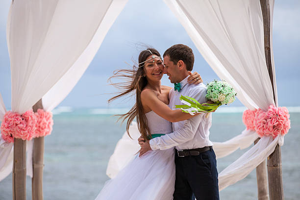istock Young loving couple wedding in gazebo. 478695578