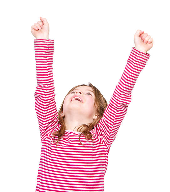 istock Happy young girl cheering with arms raised 478695649