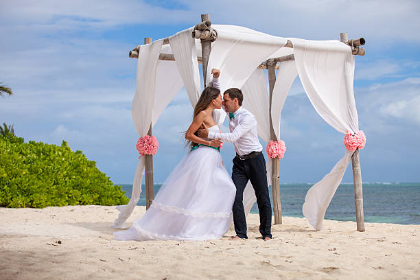 istock Young loving couple wedding in gazebo. 478697818