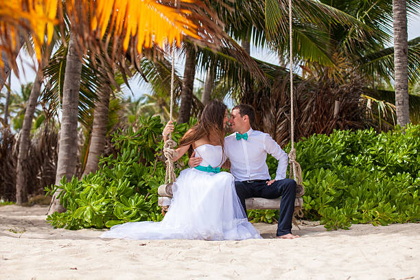 istock Young loving couple on the swing 478699186