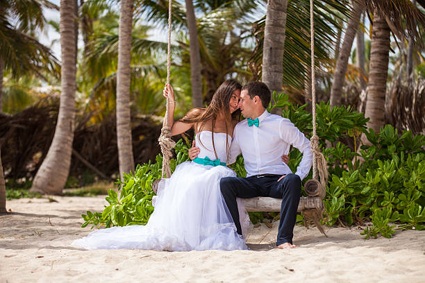 istock Young loving couple on the swing 478699188
