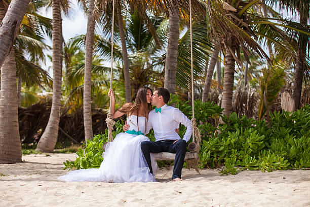 istock Young loving couple on the swing 478699190