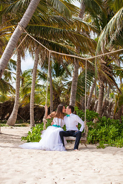istock Young loving couple on the swing 478699192