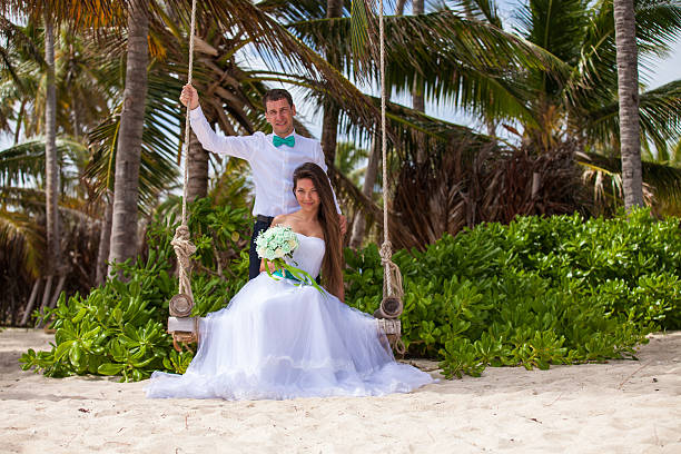 istock Young loving couple on the swing 478699202