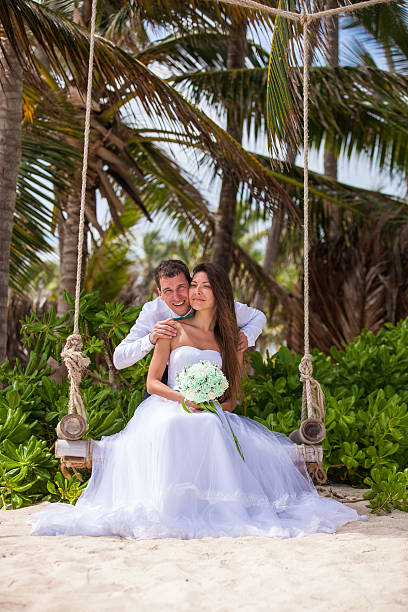 istock Young loving couple on the swing 478699208