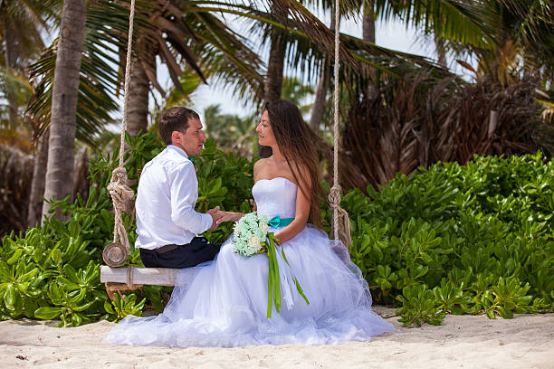 istock Young loving couple on the swing 478699246