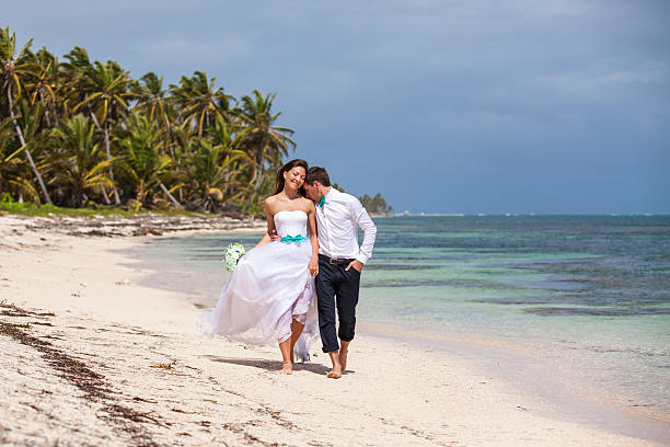 istock Beach couple walking on romantic travel. 478699354