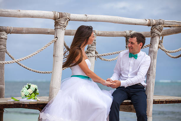istock Bride and groom together on a wharf 478699422