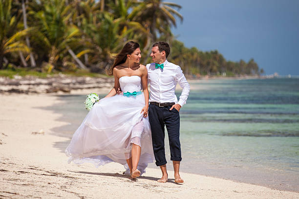 istock Beach couple walking on romantic travel. 478699530