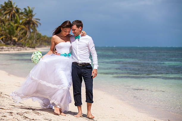 istock Beach couple walking on romantic travel. 478700416