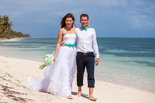 istock Beach couple walking on romantic travel. 478702692