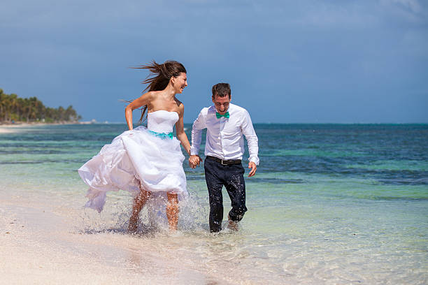 istock Beach couple walking on romantic travel. 478702706
