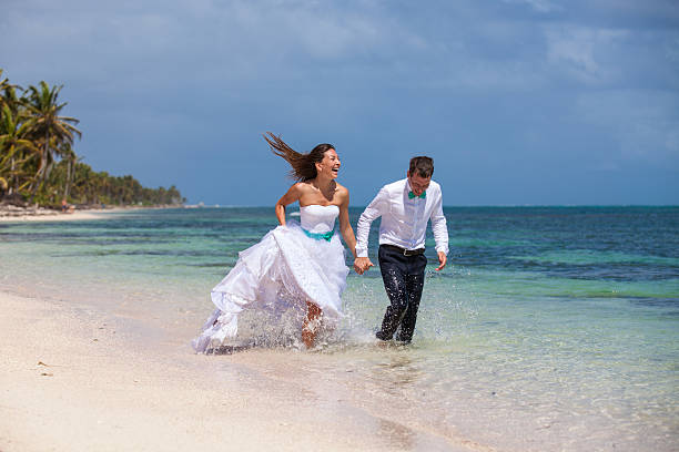 istock Beach couple walking on romantic travel. 478702708