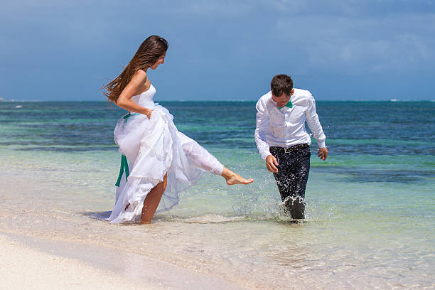 istock Beach couple walking on romantic travel. 478702716