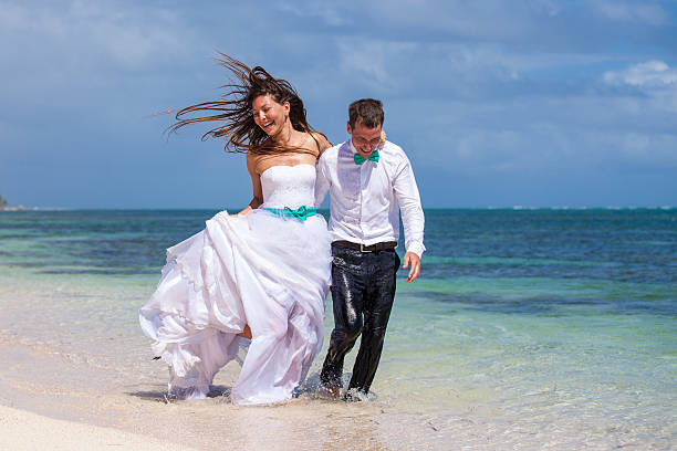 istock Beach couple walking on romantic travel. 478702722