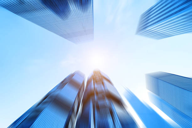 istock low angle view of modern skyscraper in blur motion 478703598